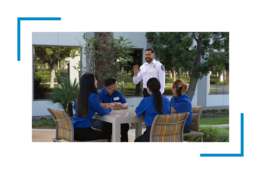 security officers chatting around a table
