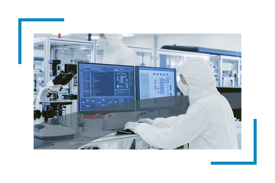 biotechnology security services: someone in hazmat suit working at computer