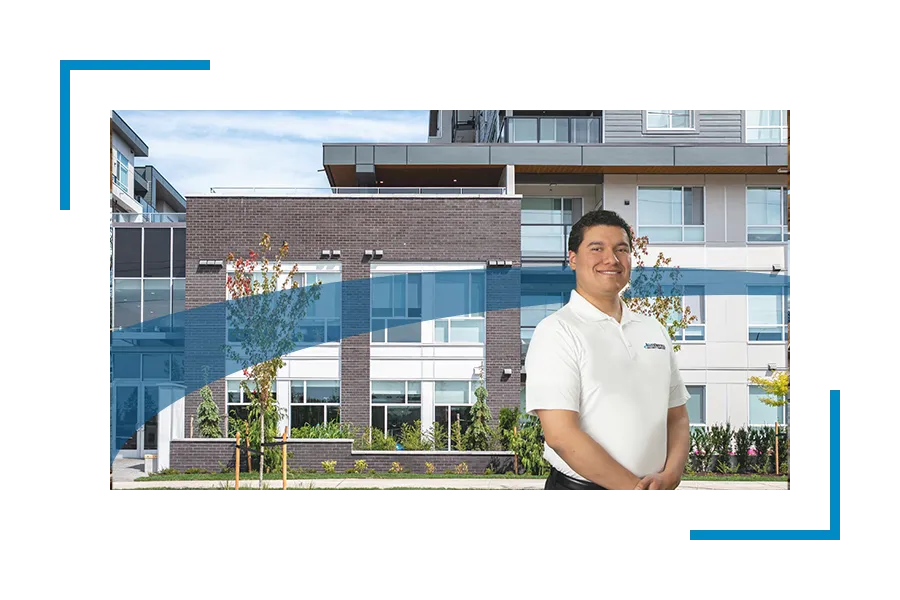 Allied universal apartment security guard standing in front of a building